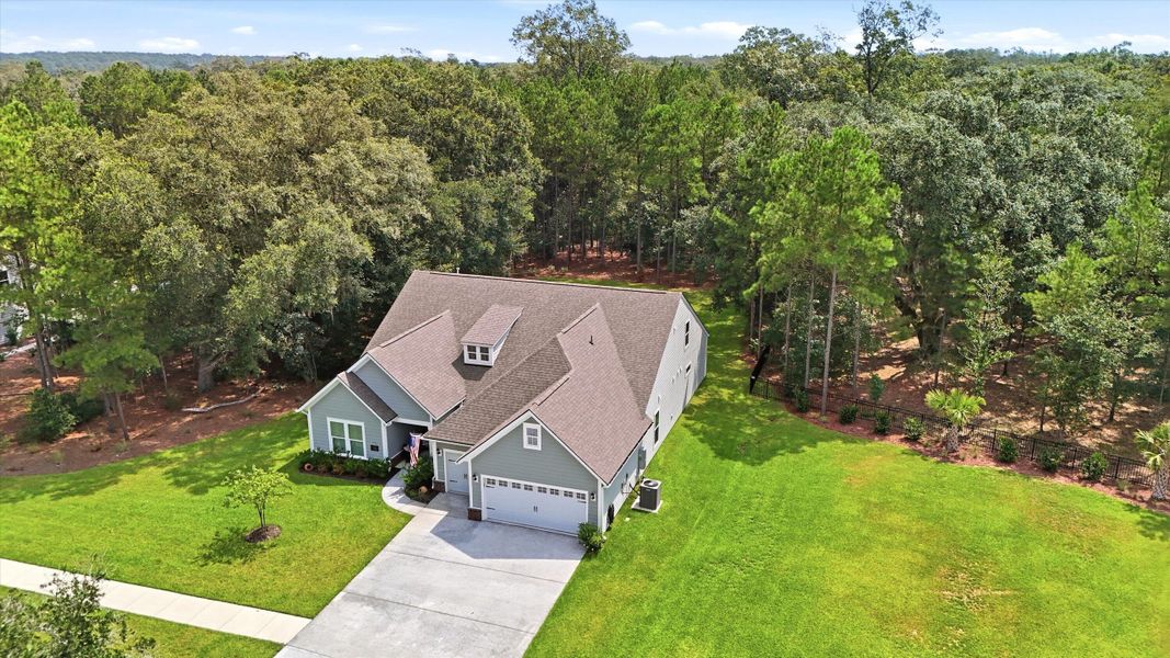 Front exterior of a new home in , Johns Island, SC, highlighting curb appeal (Image 2). Front exterior of a new home in , Johns Island, SC, highlighting curb appeal (Image 2).