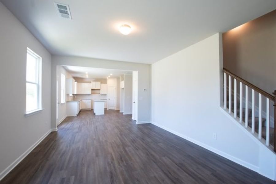 Representative unfurnished interior of a home built from the Fairfax by Piedmont Residential in Falls Creek, Flowery Branch (Image 12).