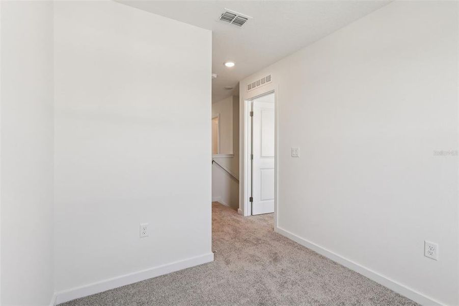 Spacious, unfurnished interior of a new home in Cyrene at Harmony, St. Cloud (Image 19).