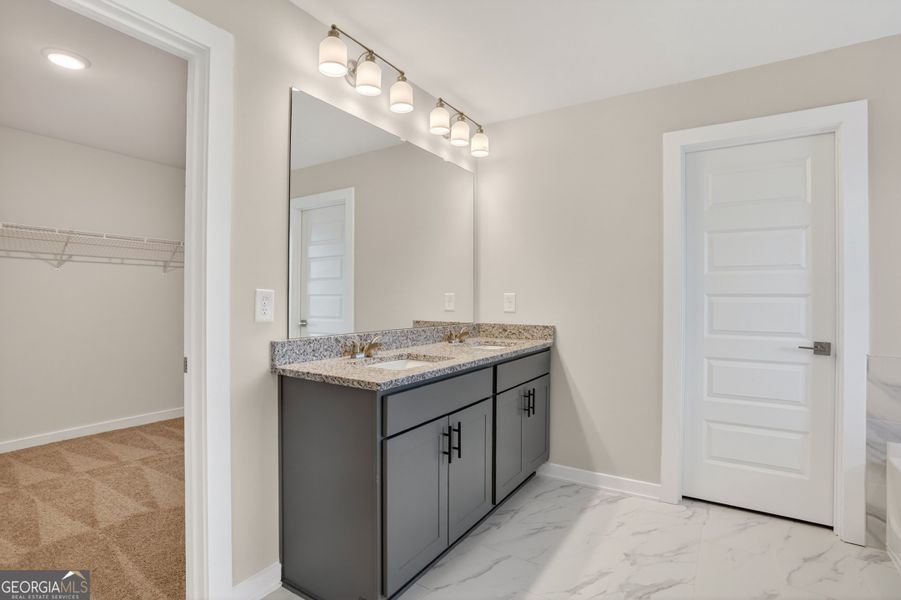 Furnished interior view inside a new home in The Fairways at Mirror Lake, Villa Rica (Image 11).