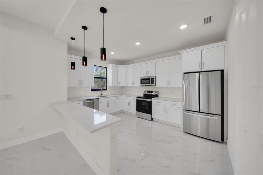 Furnished interior view inside a new home in , Port Charlotte (Image 6).