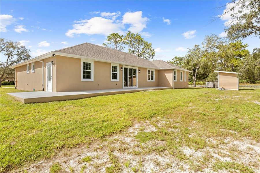 Exterior details and patio area of a home in , Weeki Wachee (Image 28).