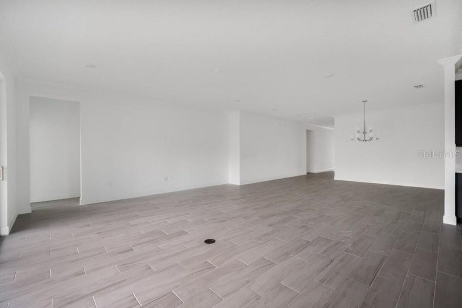 Spacious, unfurnished interior of a new home in Harvest at Ovation, Winter Garden (Image 21).