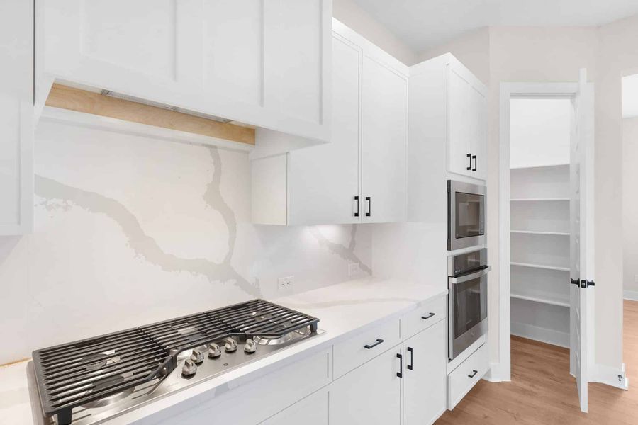 Furnished interior view inside a new home in The Grove at Blackhawk, Pflugerville (Image 11).