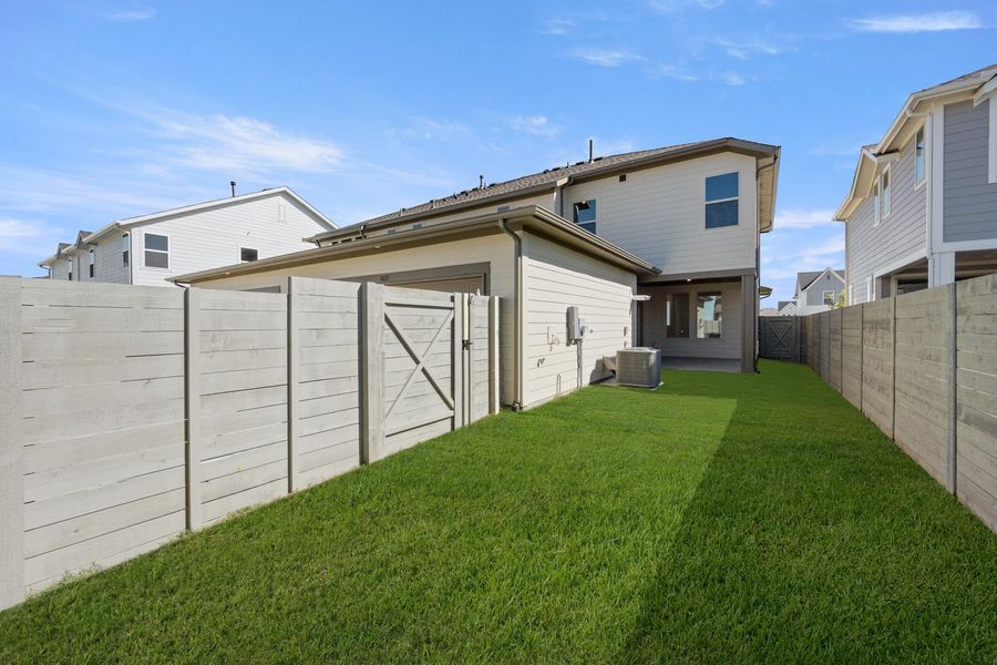 Exterior details and patio area of a home in The Retreat at Harvest, Argyle (Image 4).