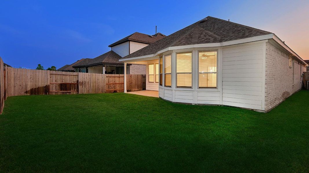 Front exterior of a new home in Mavera, Conroe, TX, highlighting curb appeal (Image 20).