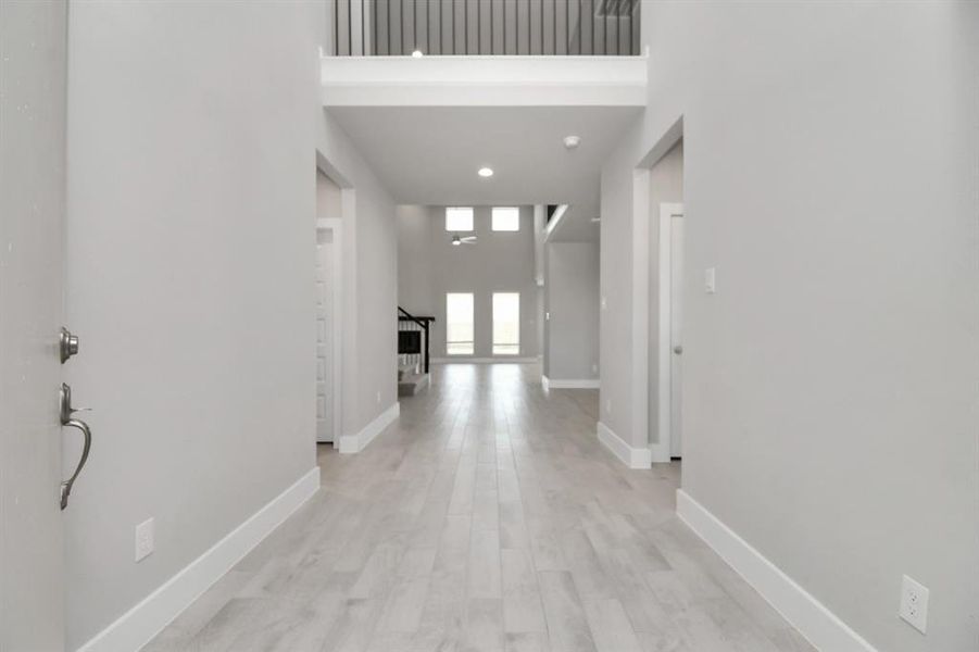 Sample photo of completed home with similar floor plan. Actual colors and selections may vary.