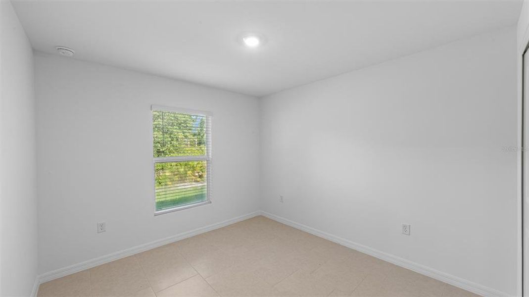 Spacious, unfurnished interior of a new home in , Port Charlotte (Image 16).