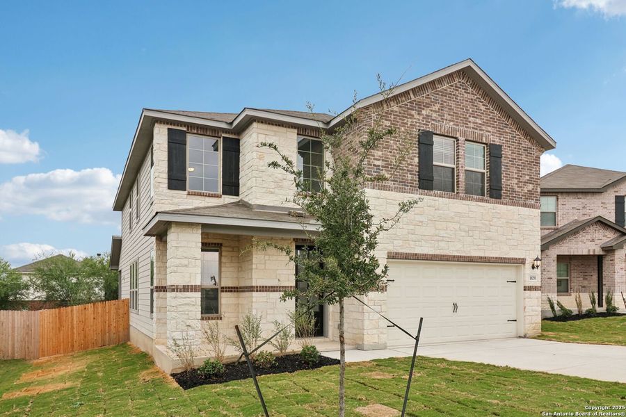 Front exterior of a new home in Royal Crest, San Antonio, TX, highlighting curb appeal (Image 26). Front exterior of a new home in Royal Crest, San Antonio, TX, highlighting curb appeal (Image 26).