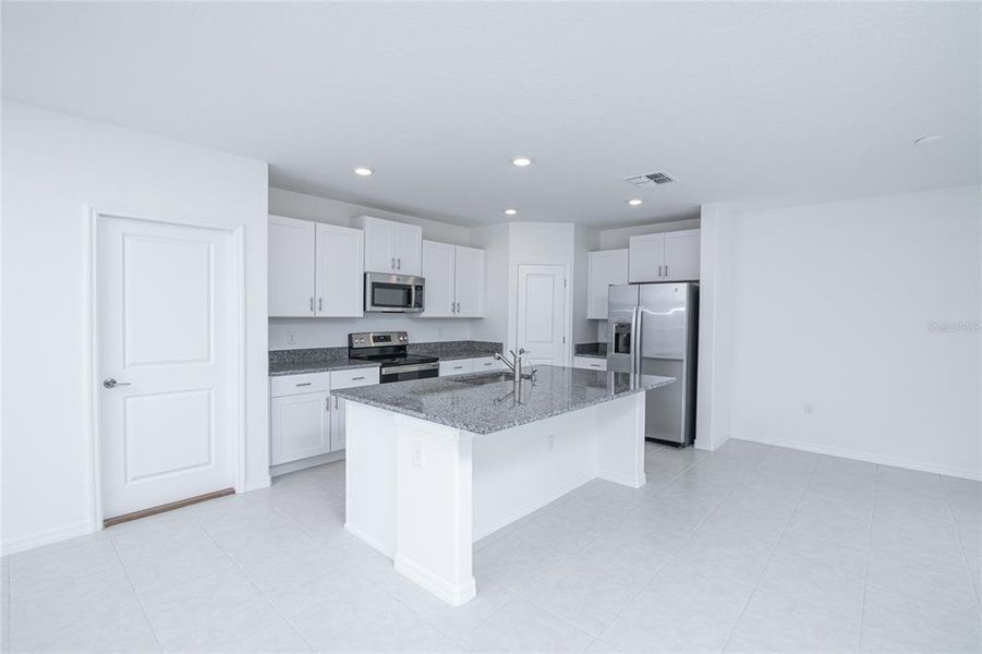 Furnished interior view inside a new home in Saddle Creek Preserve: The Manors II, Lakeland (Image 11).