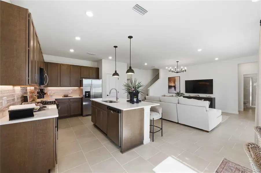 Furnished interior view inside a new home in Brystol North at Wylder, Port St. Lucie (Image 4).
