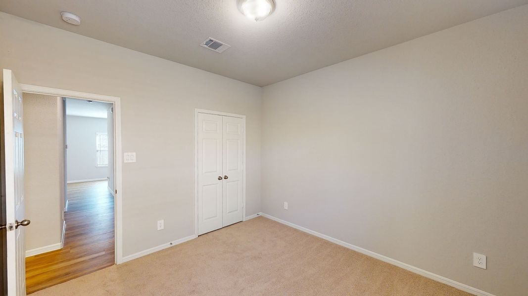 Representative unfurnished interior of a home built from the Floor Plan 1500 by Colina Homes in Cypress Green, Hockley (Image 45).