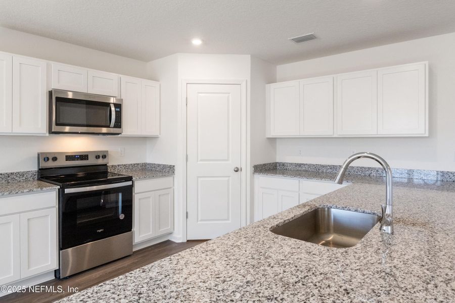 Furnished interior view inside a new home in Greystone, Glen St. Mary (Image 4).