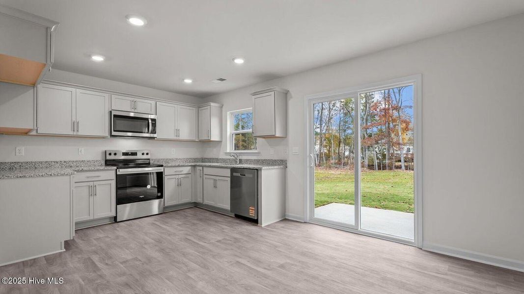 Furnished interior view inside a new home in Jetstream Park, Wilson (Image 7).
