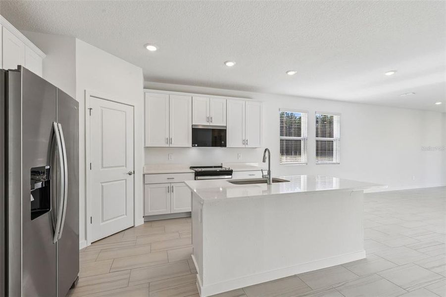 Furnished interior view inside a new home in Colbert Landings, Palm Coast (Image 6).