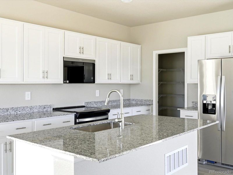 Furnished interior view inside a new home in , Thornton (Image 13).