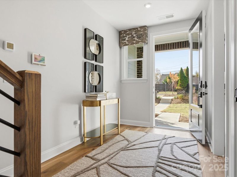 Front Foyer Through 8' Doorway. *Model Photos | Actual Finishes, Structural Selections, and Orientation May Vary.