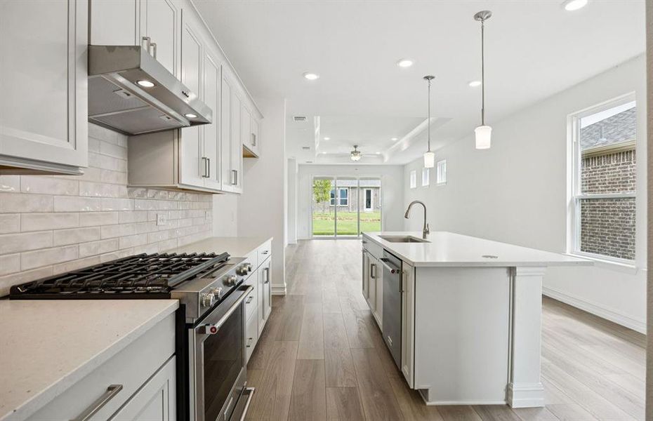 Large island overlooking gathering room