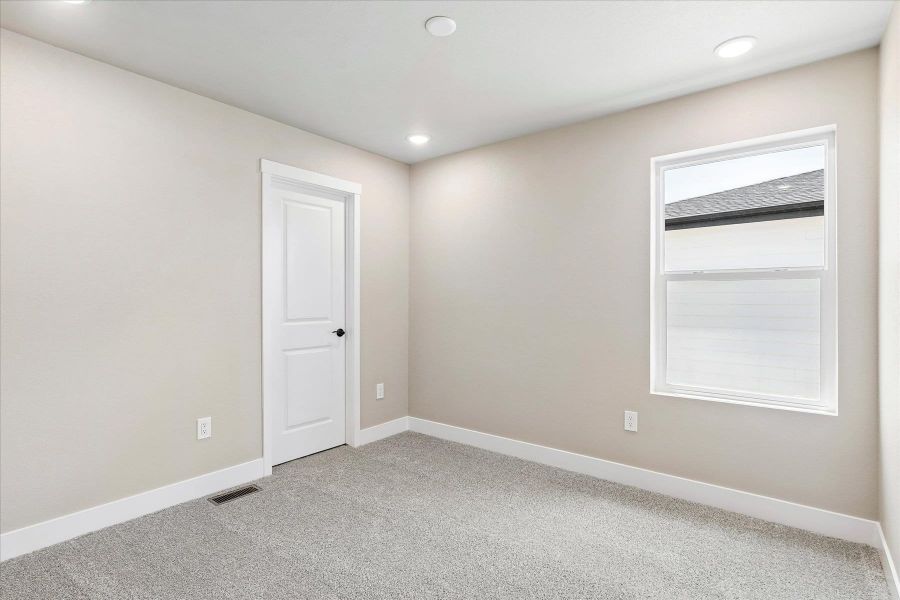 Spacious, unfurnished interior of a new home in The Trails at Aspen Ridge, Colorado Springs (Image 24).