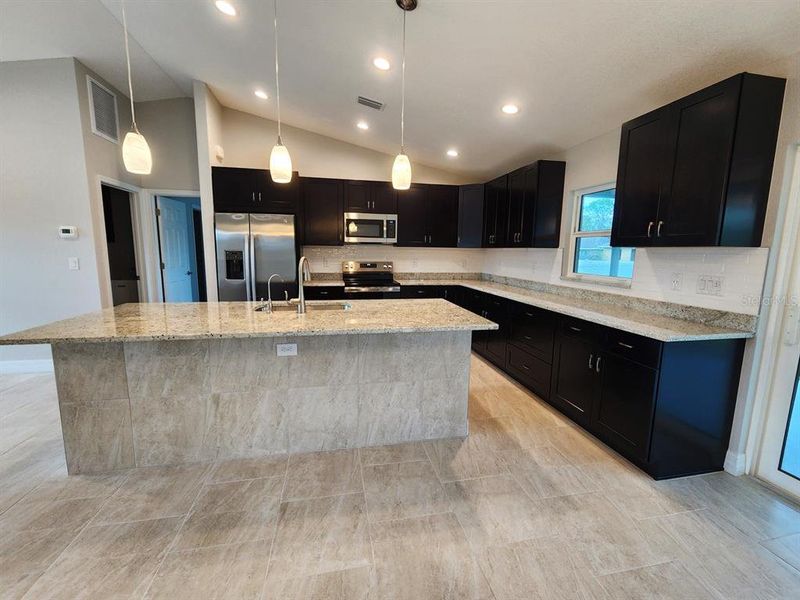 Furnished interior view inside a new home in , North Port (Image 24).