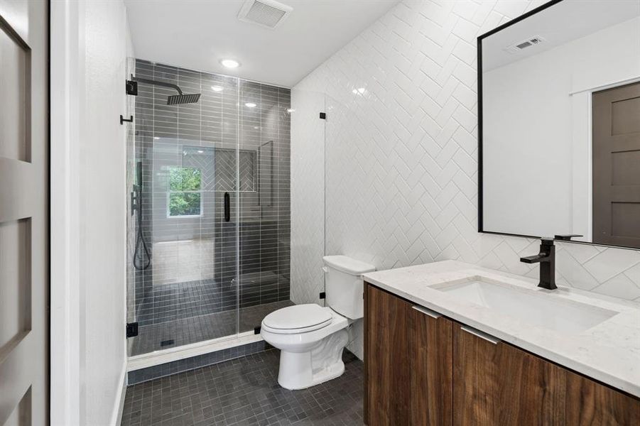Second floor primary bathroom.