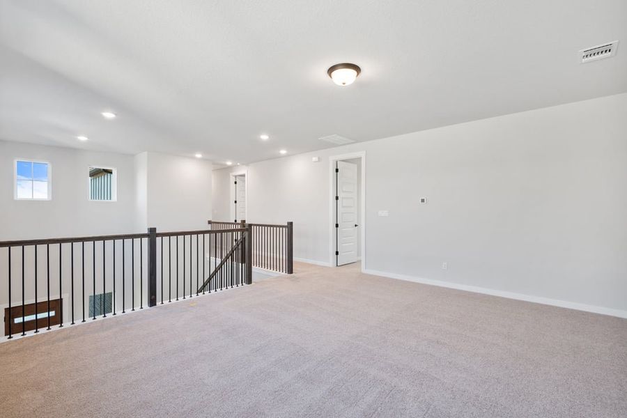 Spacious, unfurnished interior of a new home in Terrace Collection at Lariat, Liberty Hill (Image 42).