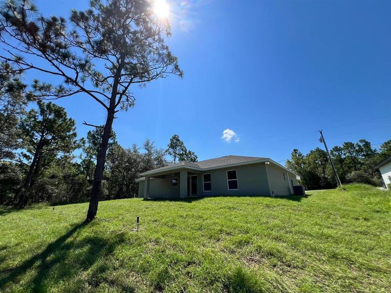 Exterior details and patio area of a home in , Citrus Springs (Image 2).