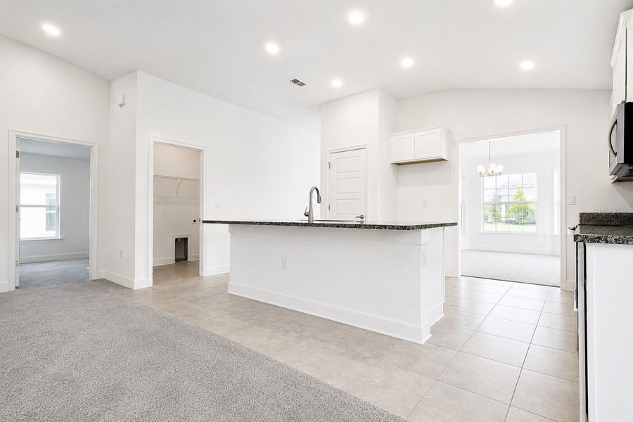 Furnished interior view inside a new home in Harmony Central, St. Cloud (Image 12).