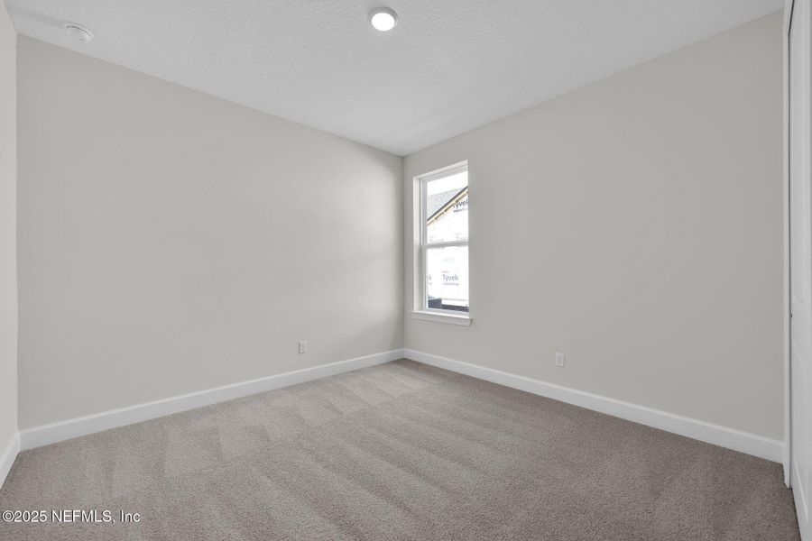 Spacious, unfurnished interior of a new home in Trailmark - Phase 6, St. Augustine (Image 21).