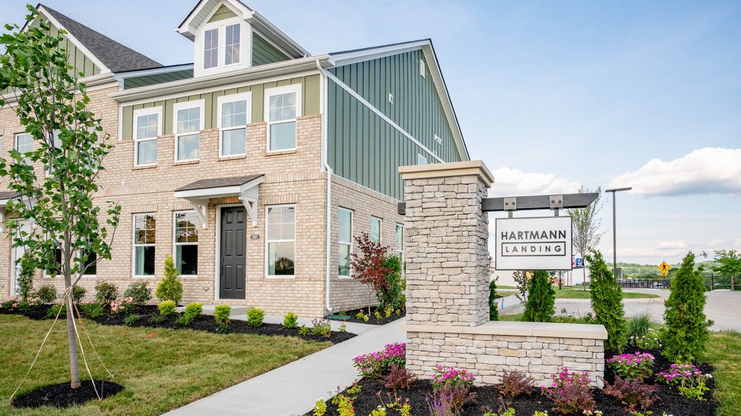 Model home exterior with monument to the side