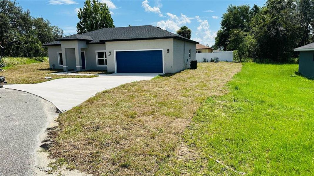 Front exterior of a new home in , Ocala, FL, highlighting curb appeal (Image 9).