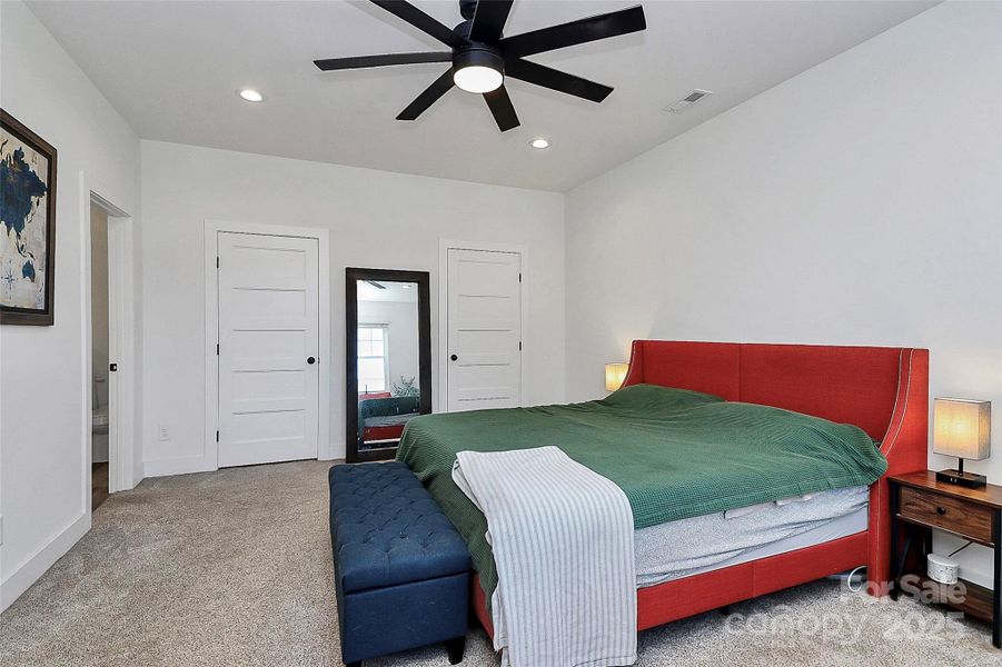 Large primary bedroom with two walk-in closets Large primary bedroom with two walk-in closets