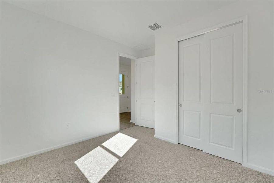 Spacious, unfurnished interior of a new home in Green Key Village, Lady Lake (Image 26).
