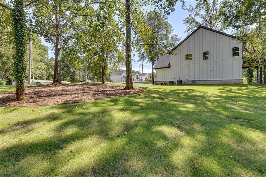 Front exterior of a new home in , Buford, GA, highlighting curb appeal (Image 2).