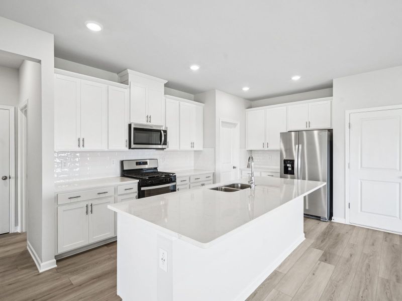 Furnished interior view inside a new home in Hawthorne Station, College Park (Image 6).