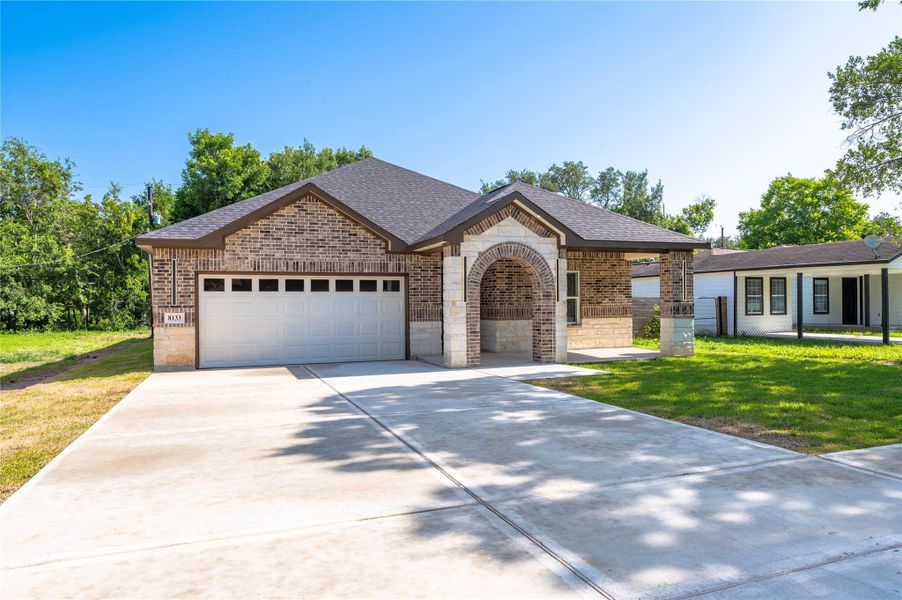 Front exterior of a new home in , Houston, TX, highlighting curb appeal (Image 23).