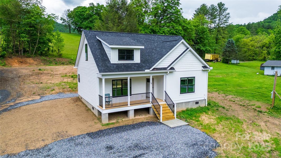 Front exterior of a new home in , Tuckasegee, NC, highlighting curb appeal (Image 16).