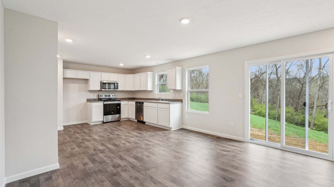 Spacious, unfurnished interior of a new home in The Pines at Blake Farm, Wilmington (Image 11).