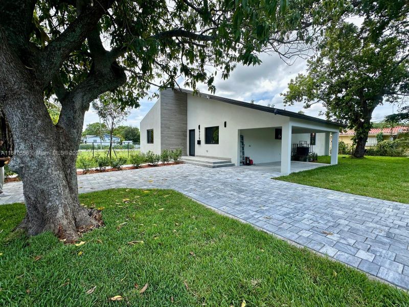 Front exterior of a new home in , Miami, FL, highlighting curb appeal (Image 26).