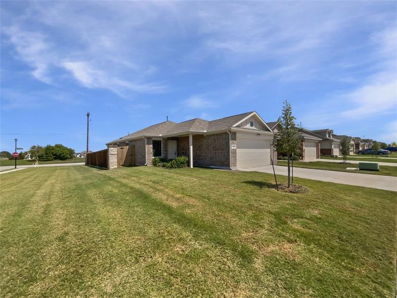 Front exterior of a new home in , Forney, TX, highlighting curb appeal (Image 17).