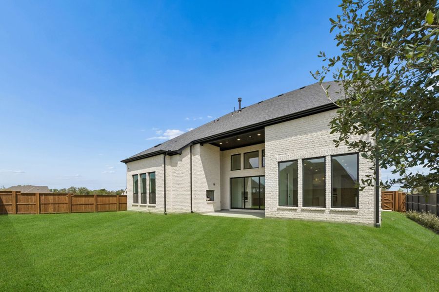 Exterior details and patio area of a home in The Parks at Wilson Creek, Celina (Image 4).