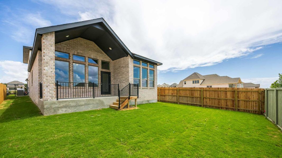 Exterior details and patio area of a home in Santa Rita Ranch - Tierra Rosa, Liberty Hill (Image 3).