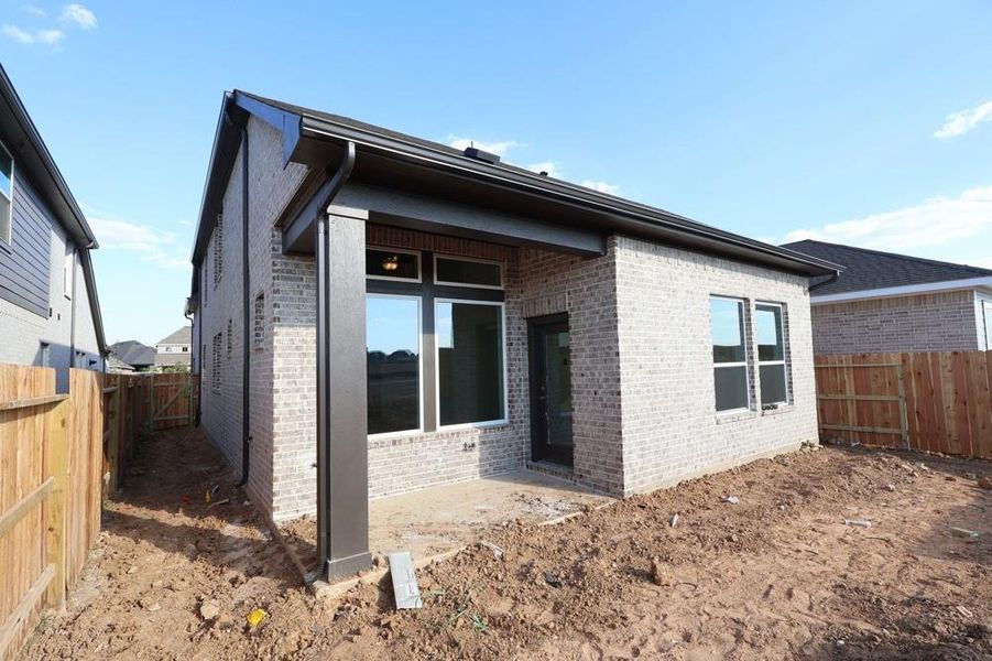 Exterior details and patio area of a home in The Grand Prairie 40’, Hockley (Image 2). Exterior details and patio area of a home in The Grand Prairie 40’, Hockley (Image 2).