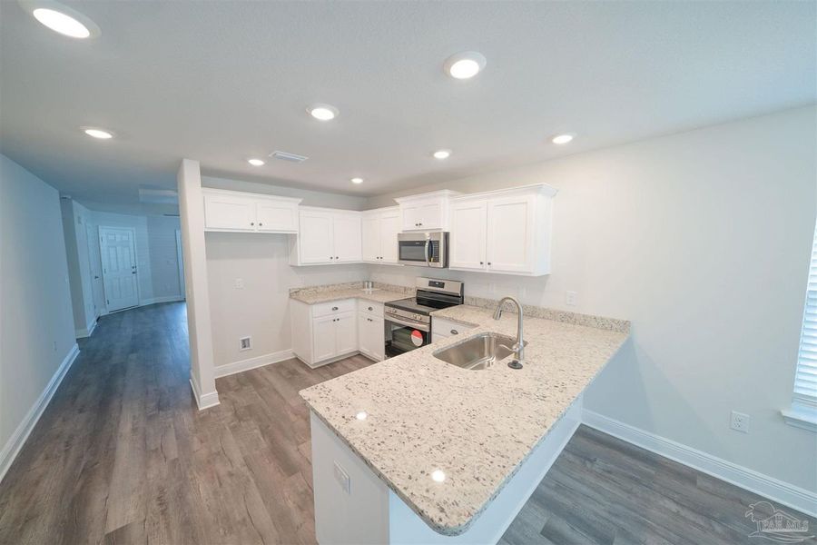 Furnished interior view inside a new home in Allison Acres, Cantonment (Image 7).