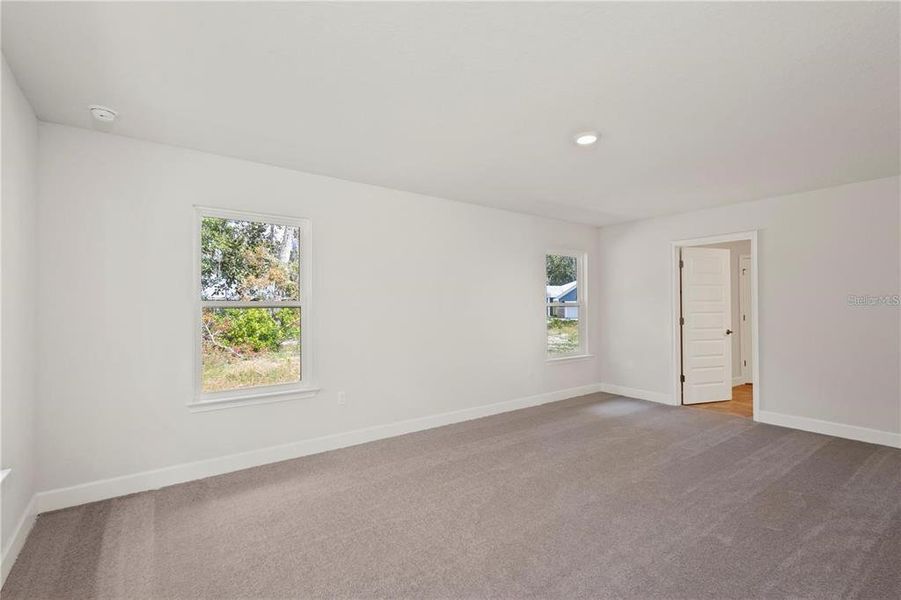 Spacious, unfurnished interior of a new home in The Preserve at Laurel Lake, Lake City (Image 11).