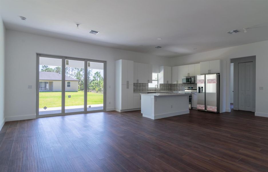 Front exterior of a new home in , Port Charlotte, FL, highlighting curb appeal (Image 1).