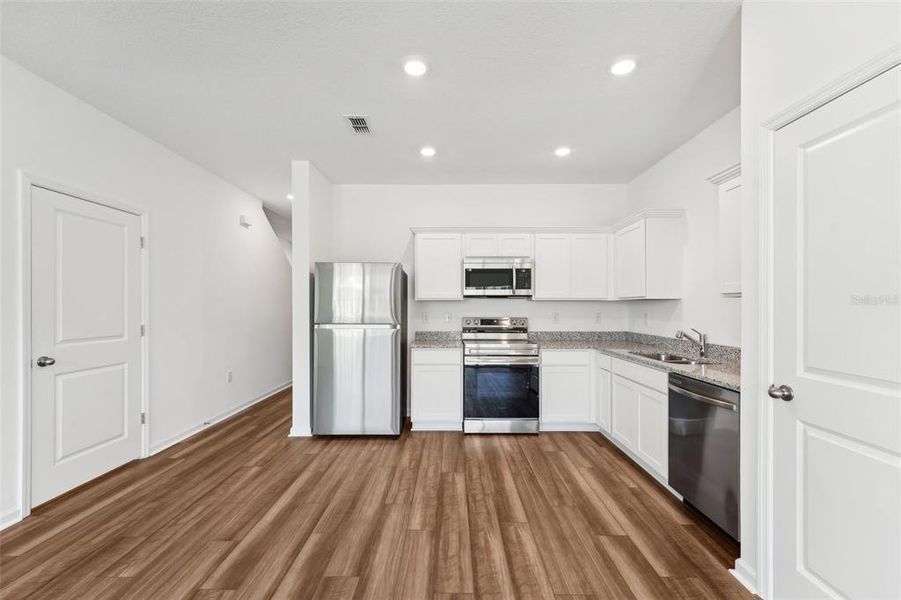 Furnished interior view inside a new home in Vista Walk, Dade City (Image 5).