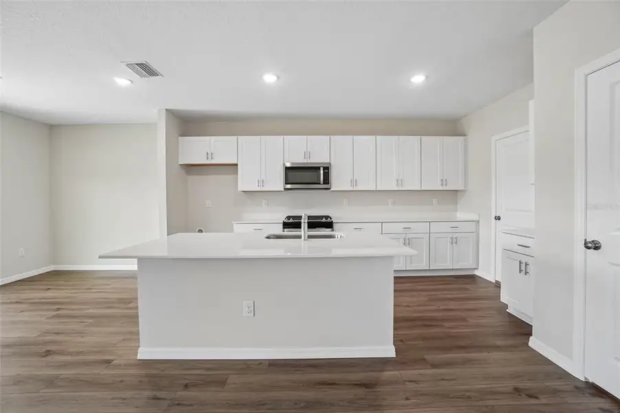 Furnished interior view inside a new home in Two Rivers, Zephyrhills (Image 3).