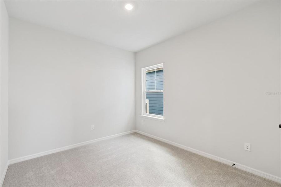 Spacious, unfurnished interior of a new home in Laureate Park at Lake Nona - Garden Series, Orlando (Image 38).