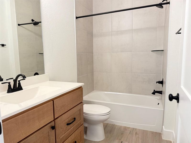 Furnished interior view inside a new home in Wood Leaf Reserve, Tomball (Image 8).